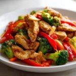 Close-up of a savory chicken and vegetable stir-fry, perfect for Easy Meal Prep Recipes.